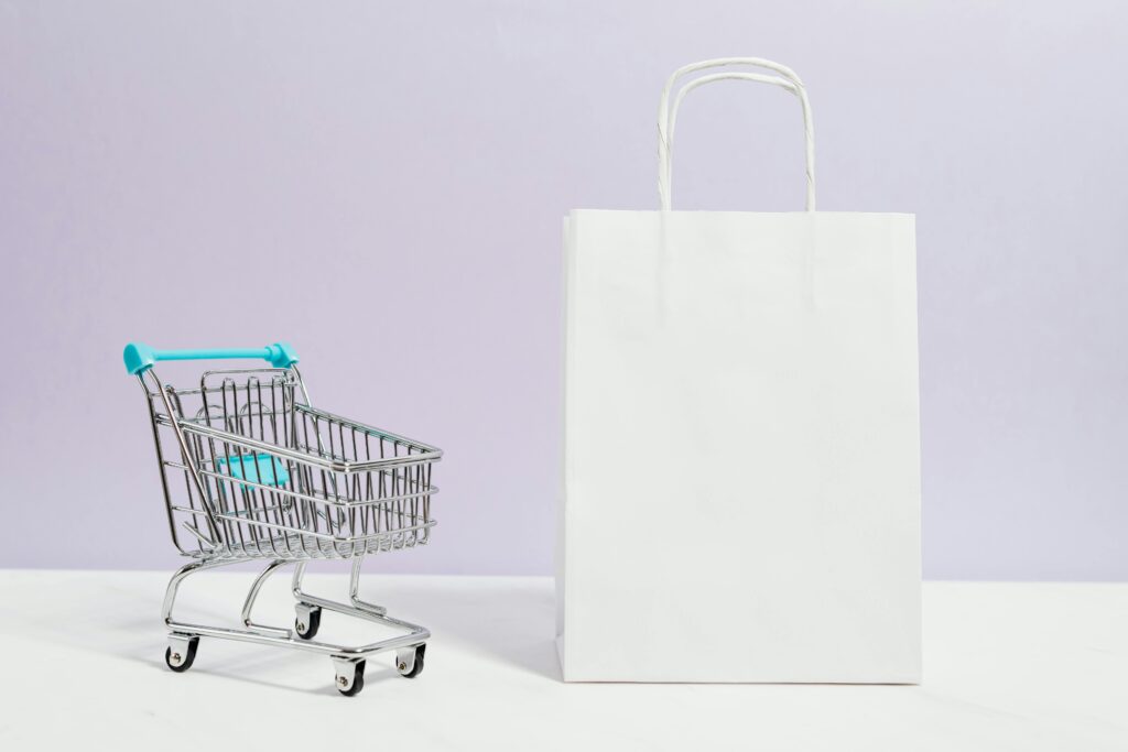 Shopping cart and a white paperbag